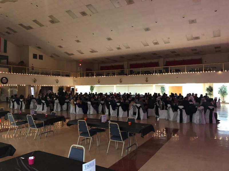 Crowd seated during event presentation