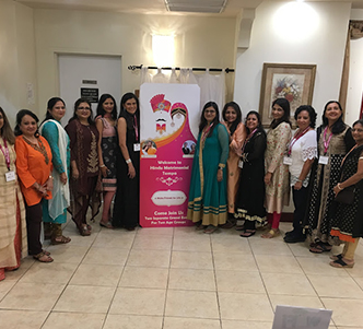Volunteers welcoming guests at the event
