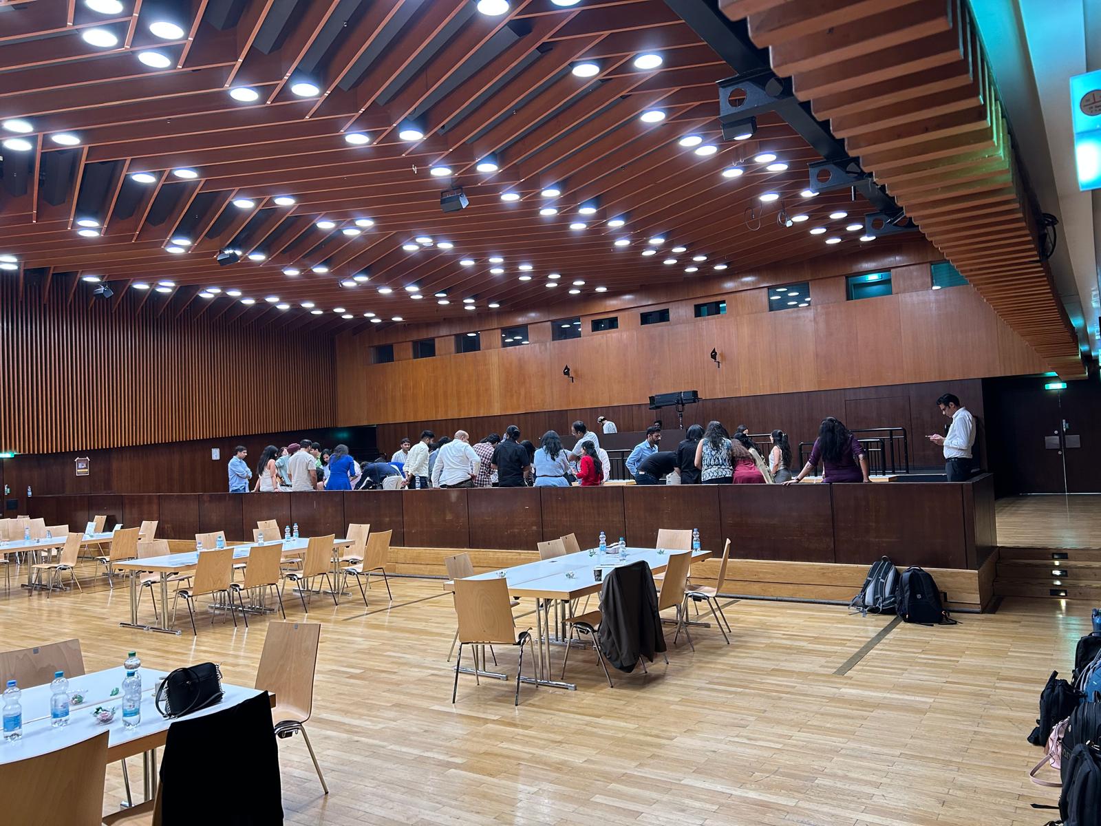Attendees gathered near the stage during a break at the HMEurope Frankfurt event